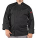 a man wearing a black chef coat