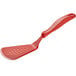 A red Linden Sweden Gourmaid silicone spatula with a wide perforated turner.