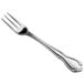 a silver fork on a white background