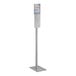 A white rectangular Kutol Health Guard hand sanitizing station with a metal base and a sign on it.