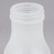 A Tablecraft white polypropylene syrup dispenser with a chrome lid.