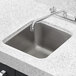 A Regency stainless steel undermount sink with one compartment.