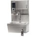 An Advance Tabco stainless steel hand sink with a faucet and soap dispenser.