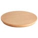 a round wooden surface with a white background