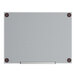 A frameless wall-mount frosted glass dry erase board with a tray at the bottom.