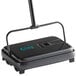 A black and grey Choice 9" single brush floor sweeper with a handle.