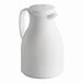 A white thermal carafe with a handle and spout.