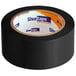 A roll of black Shurtape line set tape.