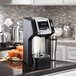 A Hamilton Beach FlexBrew Plus single-serve coffee maker on a counter.