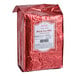 A 1.3 lb. (600 grams) bag of Bossen Black Loose Leaf Tea in a shiny red package.