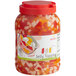 A jar of Bossen assorted rainbow jelly toppings with a lid.