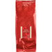 A red bag of Bossen Coffee Black Loose Leaf Tea.