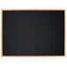 A black chalk board with a wooden frame.