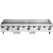 A Wolf stainless steel countertop gas griddle with manual controls.