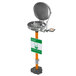 A Guardian Equipment pedestal mounted eyewash station with a metal cover over a water fountain.