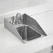 A stainless steel one-compartment drop-in sink with a gooseneck faucet and side splashes.