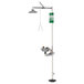 A Guardian polished chrome eye and face wash safety station with a green sign above the shower head.