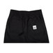 Black Chef Revival chef trousers with a white patch on the side.