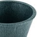 A black polyethylene ramekin with a lid on a table.