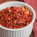 a bowl of red pepper flakes