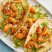 shrimp tacos on a plate