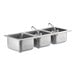 A Regency stainless steel drop-in sink with three compartments and two swing faucets.