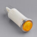 A close-up of a yellow ServIt power indicator light.