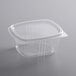 A Choice clear plastic deli container with a lid.