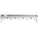 A stainless steel Regency utility shelf with mop and broom holders and rag hooks.