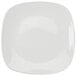 A white square Tuxton china plate with a white rim.