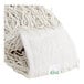 A close-up of a white Choice Natural Cotton Cut End Wet Mop Head with a green tag.