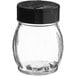 a clear glass jar with a black lid