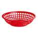 A red plastic round fast food basket with holes.