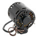 A black Bally evaporator fan motor with wires and a cord.