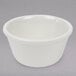 A white Thunder Group Bone Smooth Melamine Ramekin.