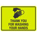 A yellow and black sign with the words "Thank You For Washing Your Hands" and symbols of hands washing.
