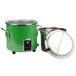 A green Vollrath stock pot with a lid.