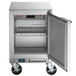 A silver Beverage-Air undercounter freezer with the door open.