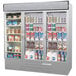 A Beverage-Air MarketMax stainless steel refrigerator with glass doors displaying a variety of products.