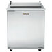 A stainless steel Traulsen refrigerator with a white rectangular top.