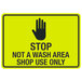 A yellow sign with black text and a symbol of a hand with a black background.