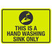 A yellow and black aluminum sign with a hand washing symbol and black text reading "This Is A Hand Washing Sink Only"