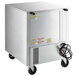 A silver rectangular Beverage-Air undercounter freezer with wheels.