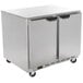 a silver refrigerator on wheels