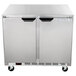 a silver refrigerator with wheels