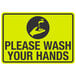 A yellow and black aluminum sign with black text reading "Please Wash Your Hands" next to a hand holding a faucet.