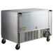 A Beverage-Air stainless steel undercounter refrigerator with glass doors on wheels.