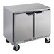 A silver Beverage-Air undercounter refrigerator with two doors and wheels.