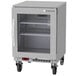 A Beverage-Air stainless steel undercounter freezer with shelves and wheels.