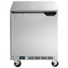 A silver Beverage-Air undercounter freezer with wheels.